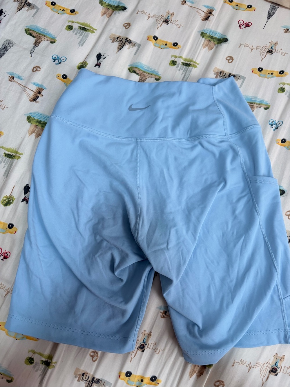 Nike Women’s Sky Blue High-Waist Bike Shorts with Pockets